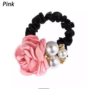 Elegant hair tie with flower and faux Pearls.NWT